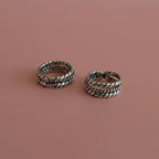 Flat lay image of Twisted Double-Rope Oxidized Toe Rings
