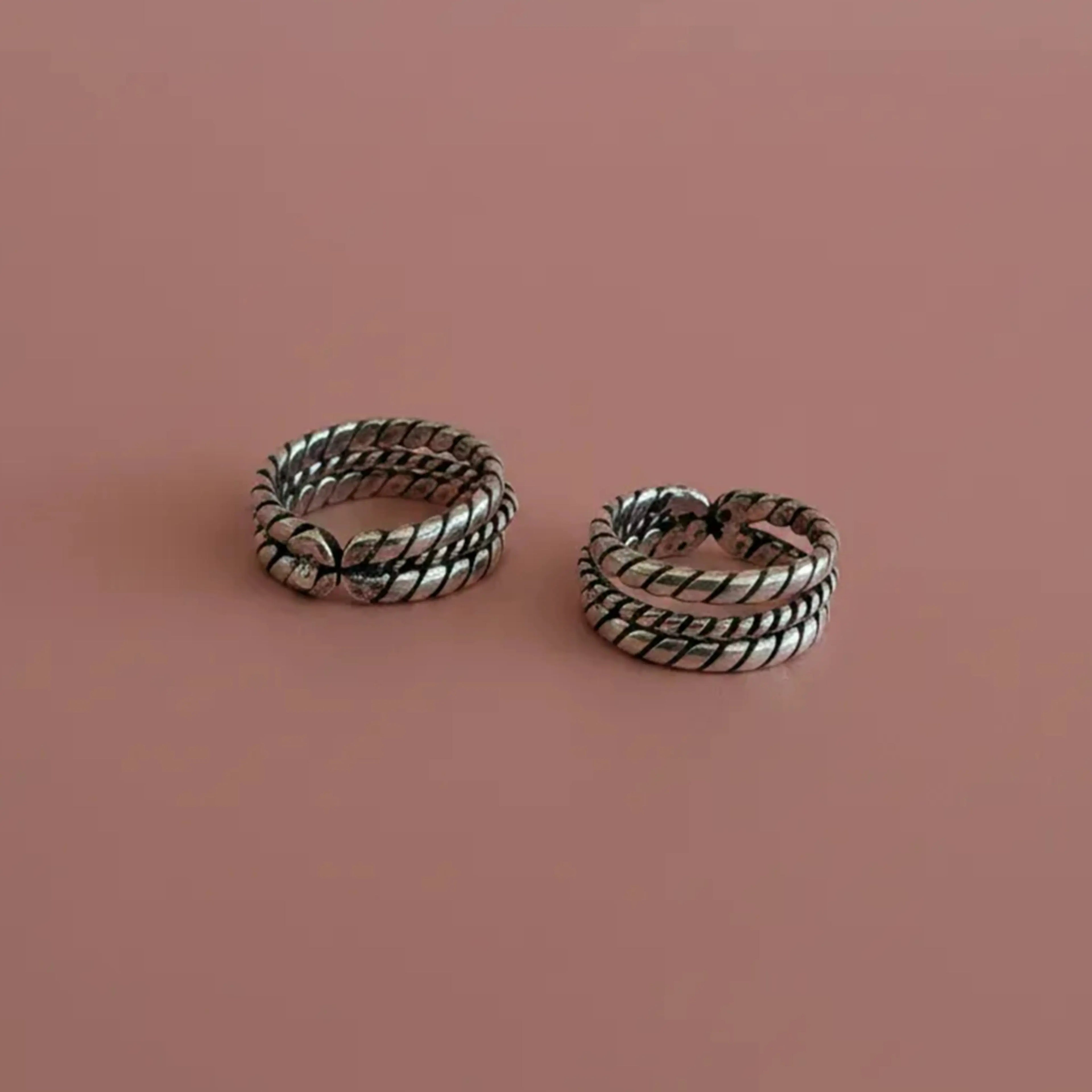 Flat lay image of Twisted Double-Rope Oxidized Toe Rings