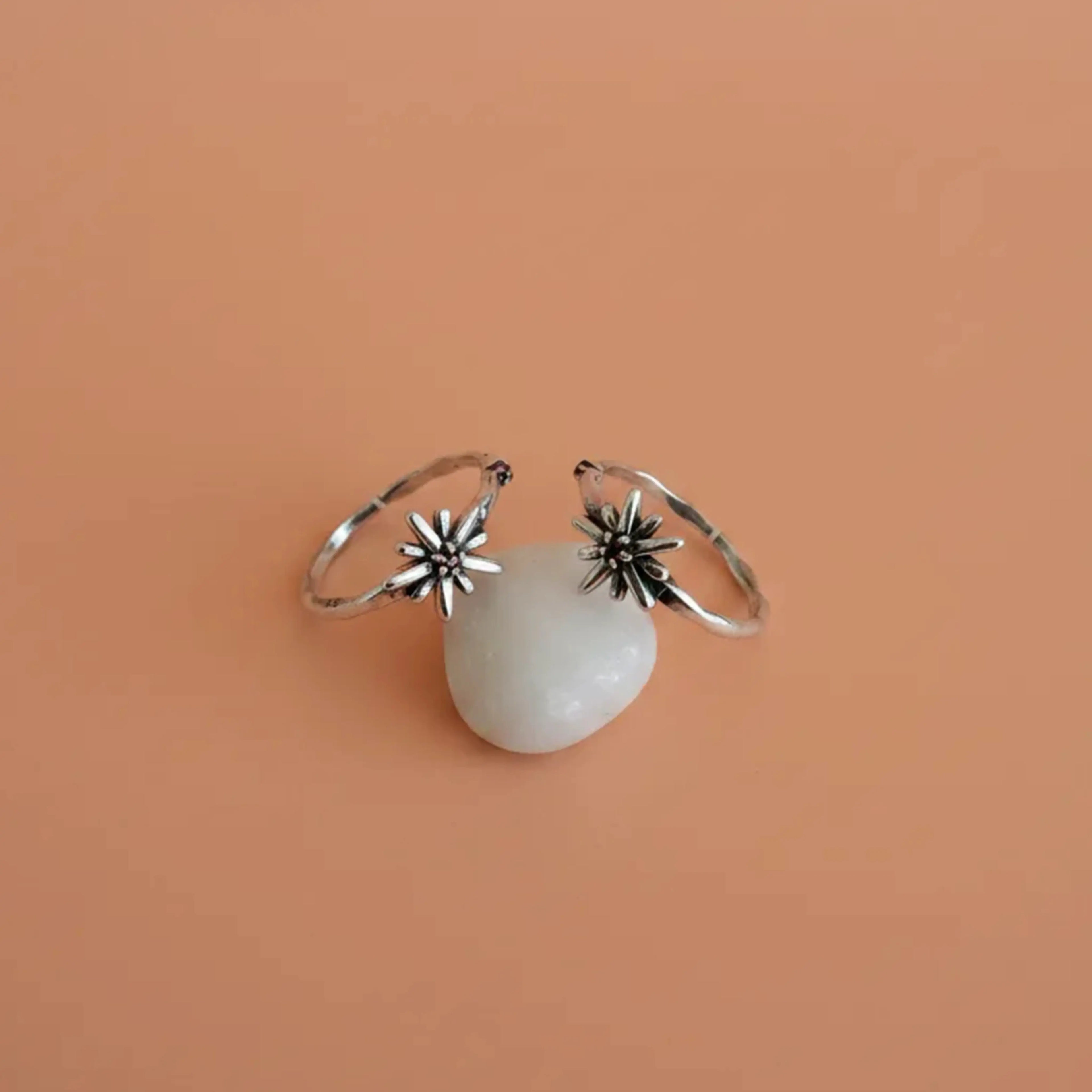 Starry Flora Oxidised Toe Rings on solid background