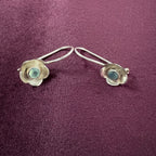 Azure Bloom sterling silver earrings by Bhavya Silvers featuring delicate floral design and polished silver finish.