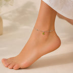 Sterling silver sunflower snake chain anklet pair featuring delicate design and adjustable clasp, perfect for ankle jewelry.