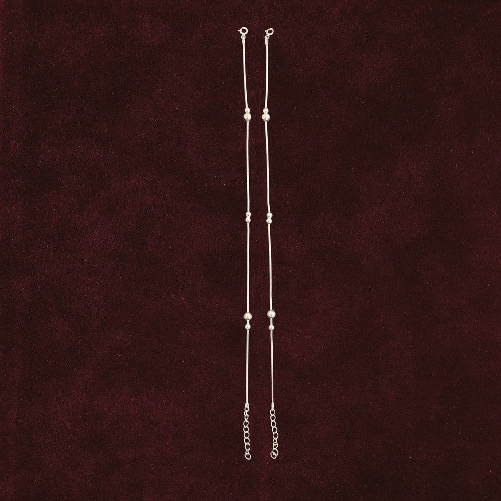Silver Beads Anklet Pair on maroon background
