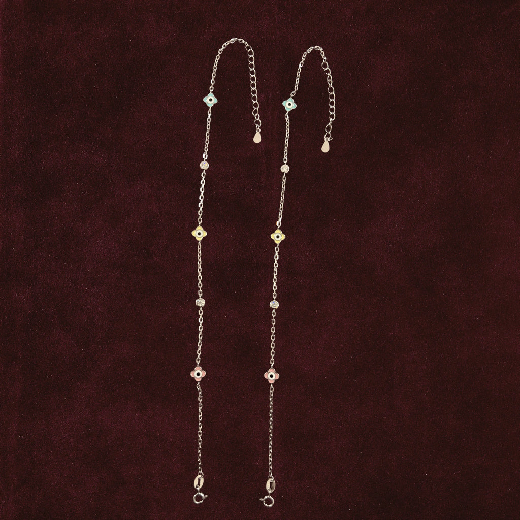Vigilant Glimmer Multi-Color Charm Anklets Anklet Pair on maroon background
