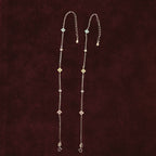 Vigilant Glimmer Multi-Color Charm Anklets Anklet Pair on maroon background