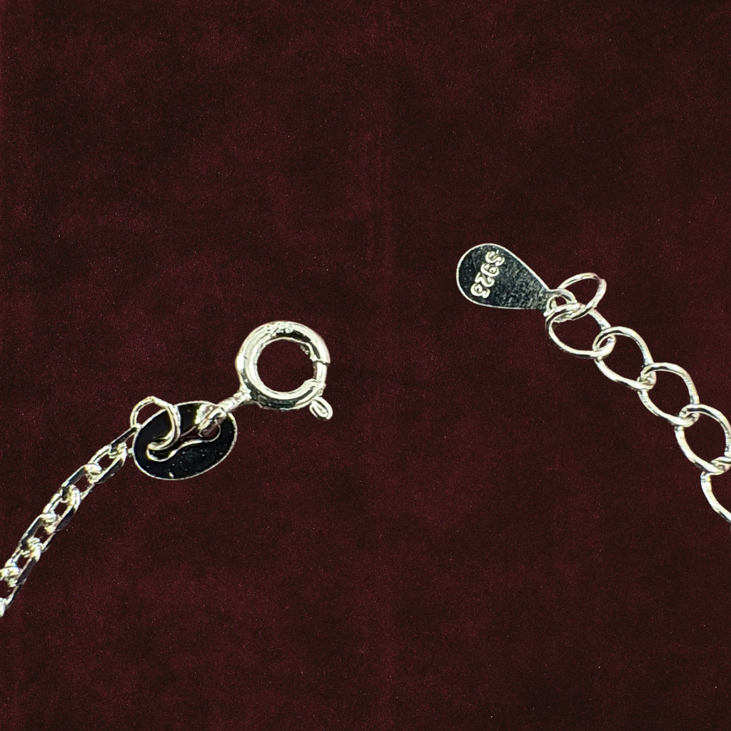 Closeup of Serene Sentinel Evil Eye Anklet hook