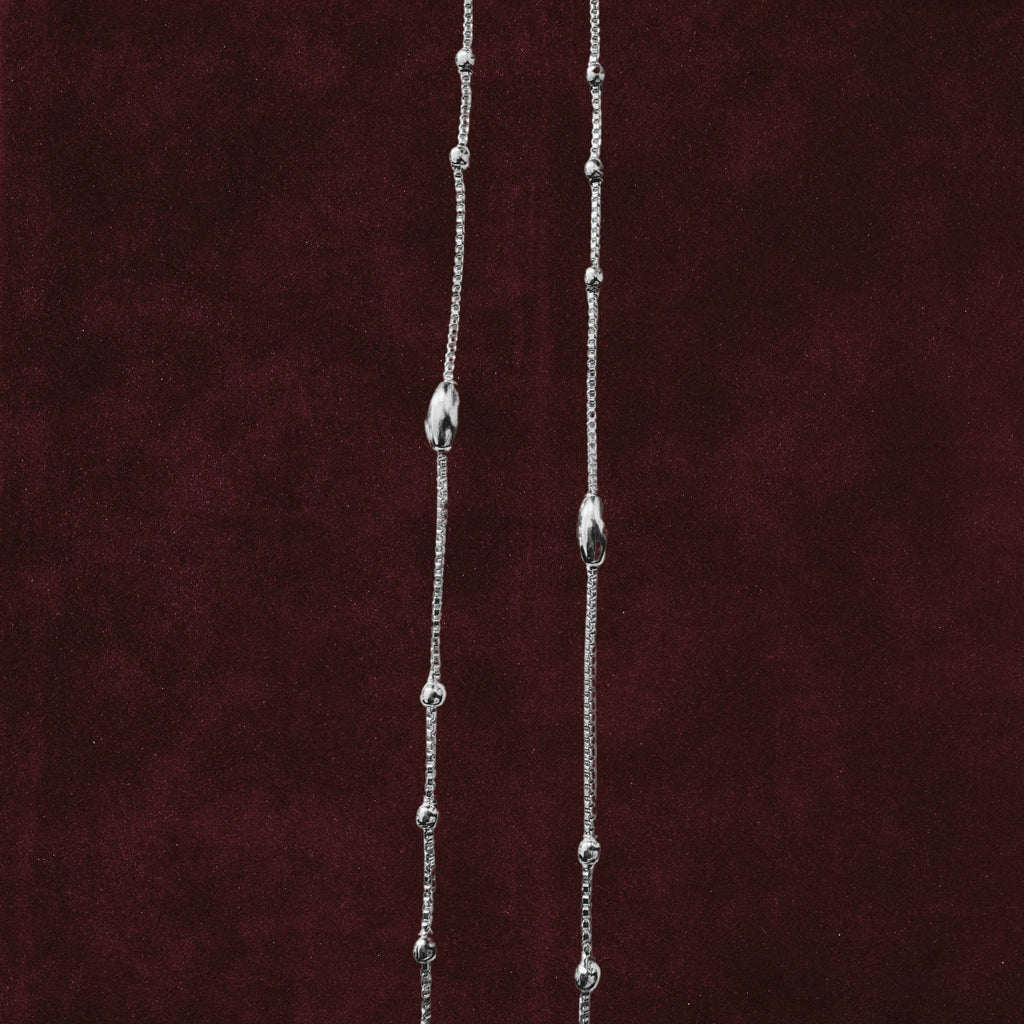 Celestial Orbit Anklet Pair closeup