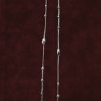 Celestial Orbit Anklet Pair closeup