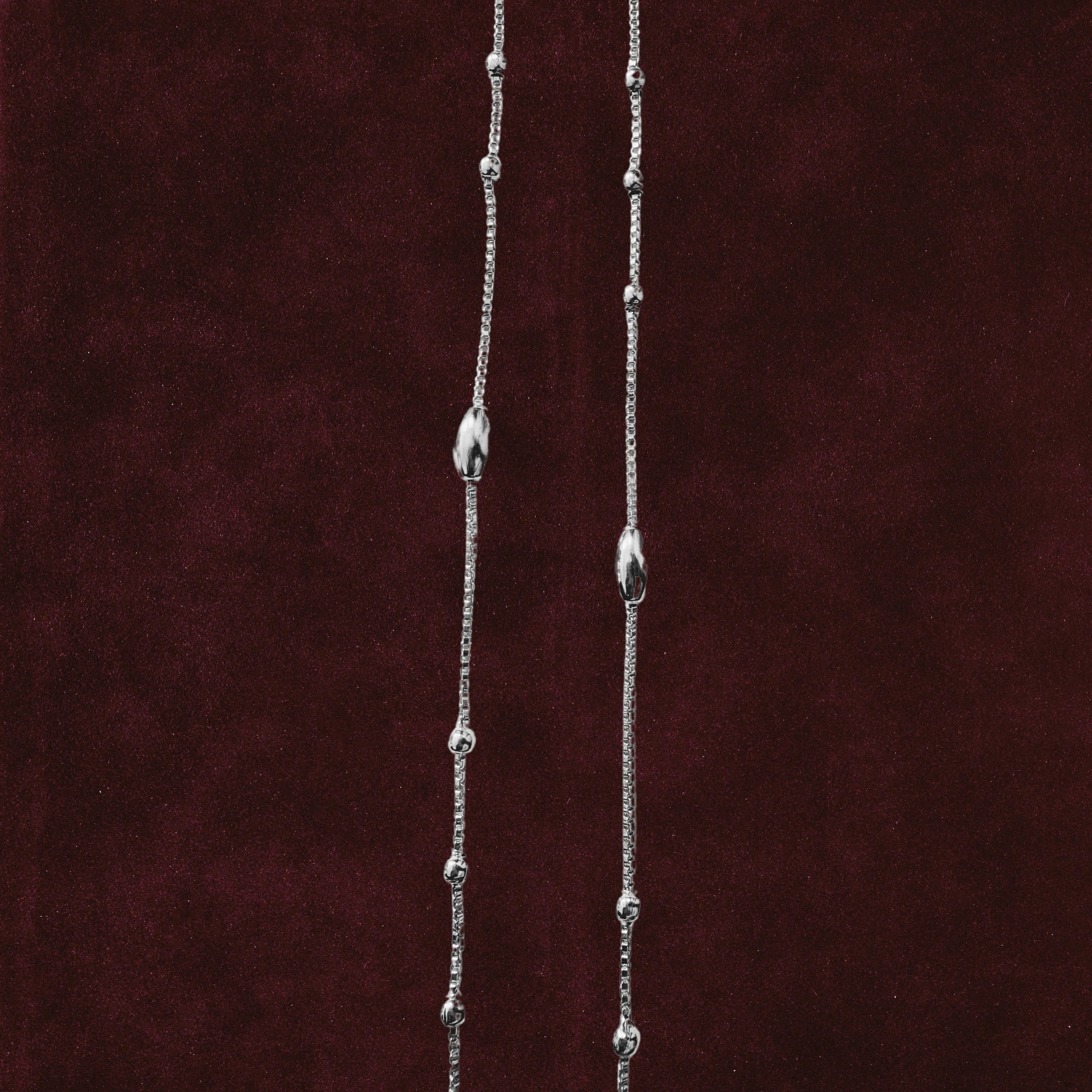 Celestial Orbit Anklet Pair closeup