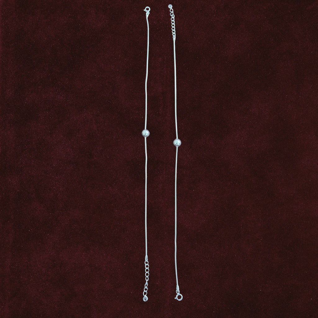 Silver Orb Snake Chain Anklet Pair on maroon background