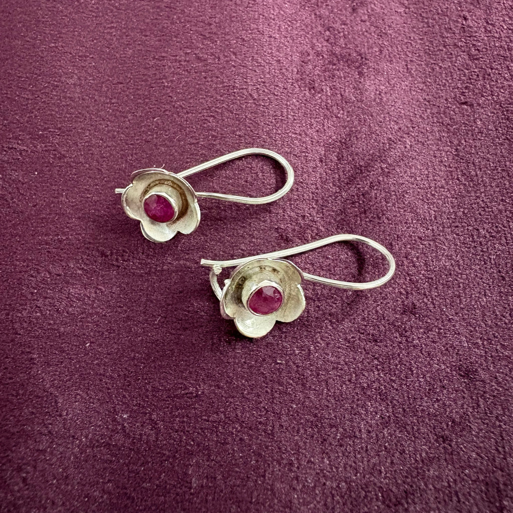 Crimson Bloom Sterling Silver Earrings on maroon background