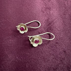 Crimson Bloom Sterling Silver Earrings on maroon background