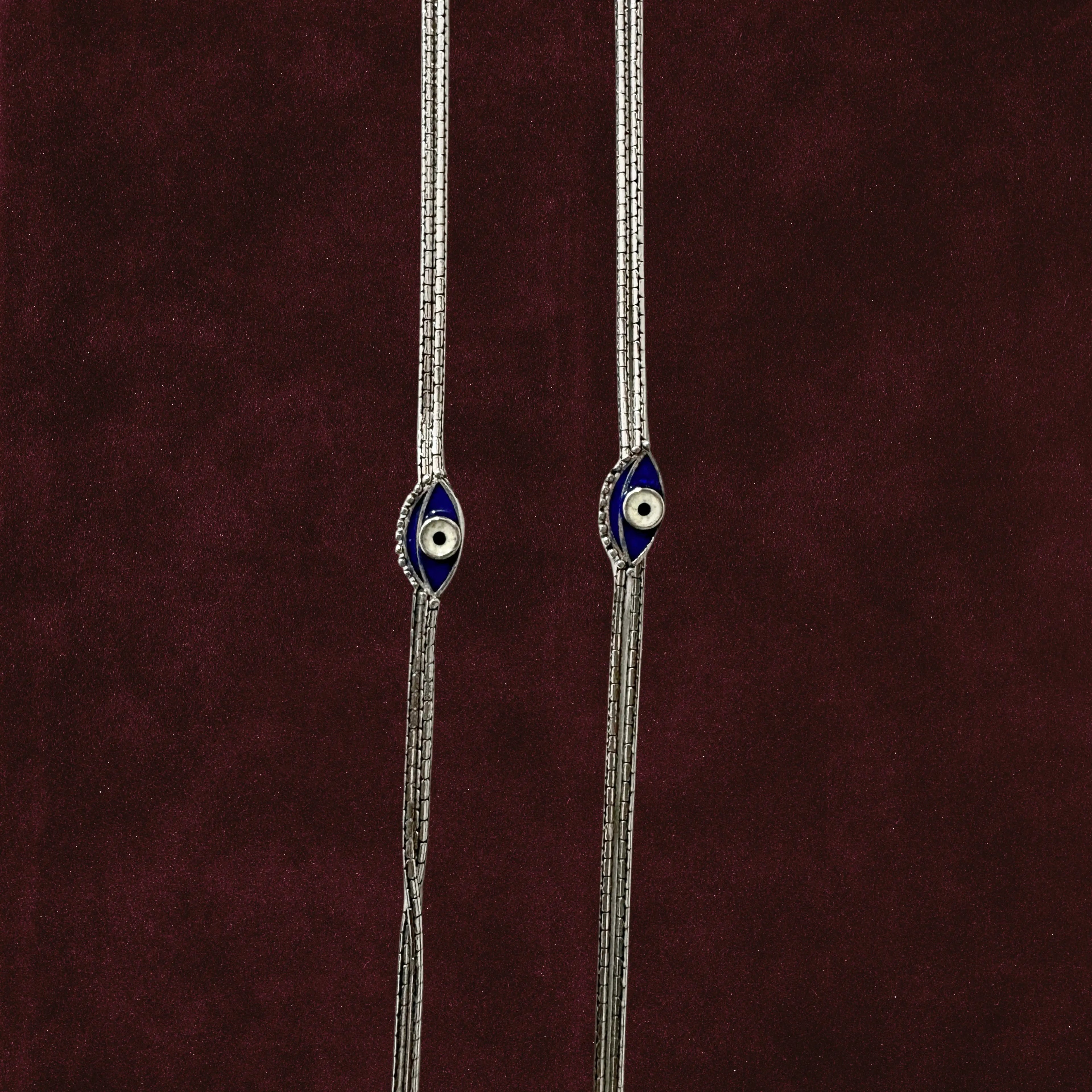 Sapphire Evil Eye Anklet Pair closeup on a solid background