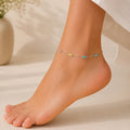 Close up image of Indian model wearing Fish Charm Anklet