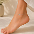 Close up image of Indian model wearing Silver orb snake chain Anklet