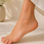 Close up image of Indian model wearing Silver orb snake chain Anklet