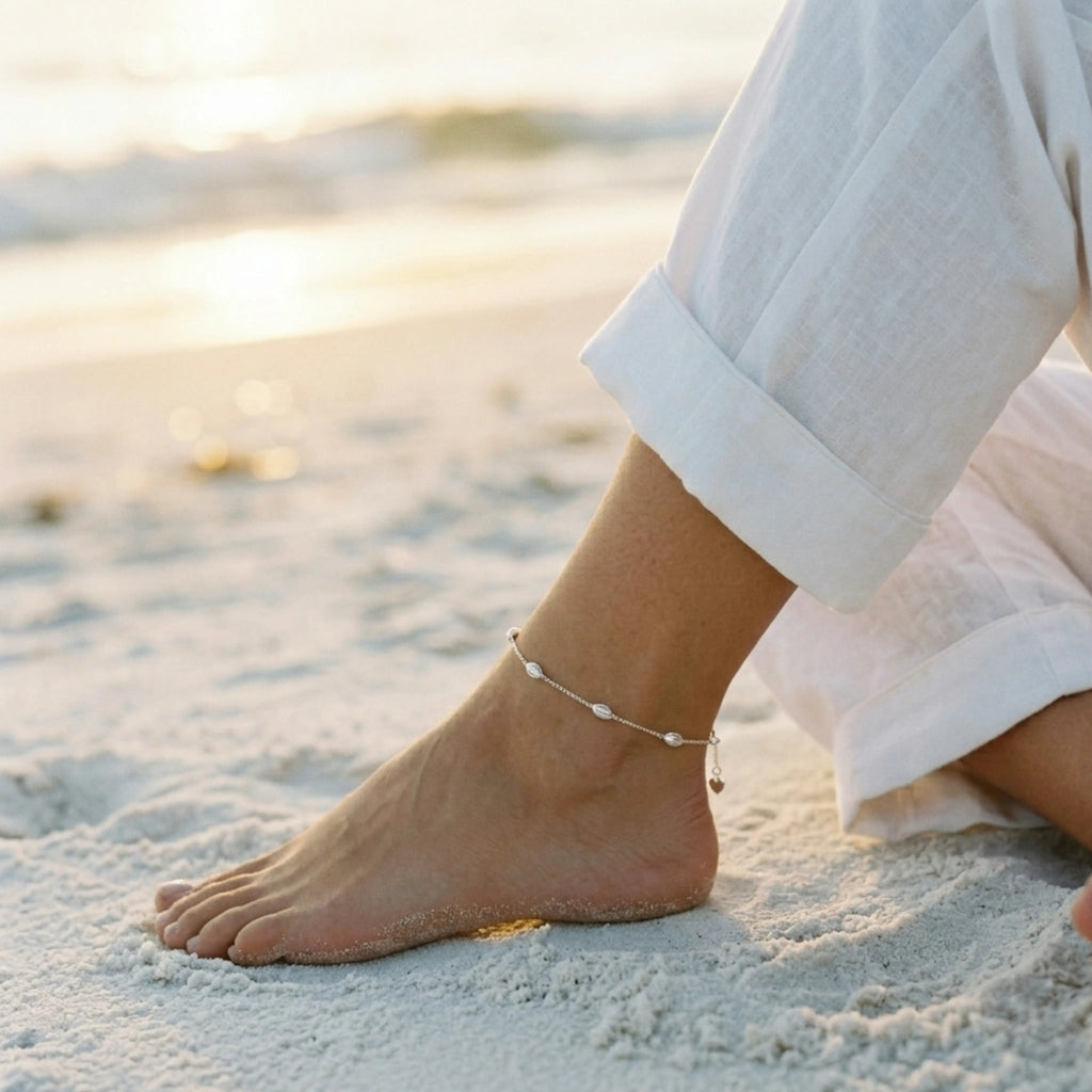 Close up image of Indian model wearing sculpted oval link anklet