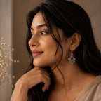 Woman wearing a 925 Silver earrings with green gemstone