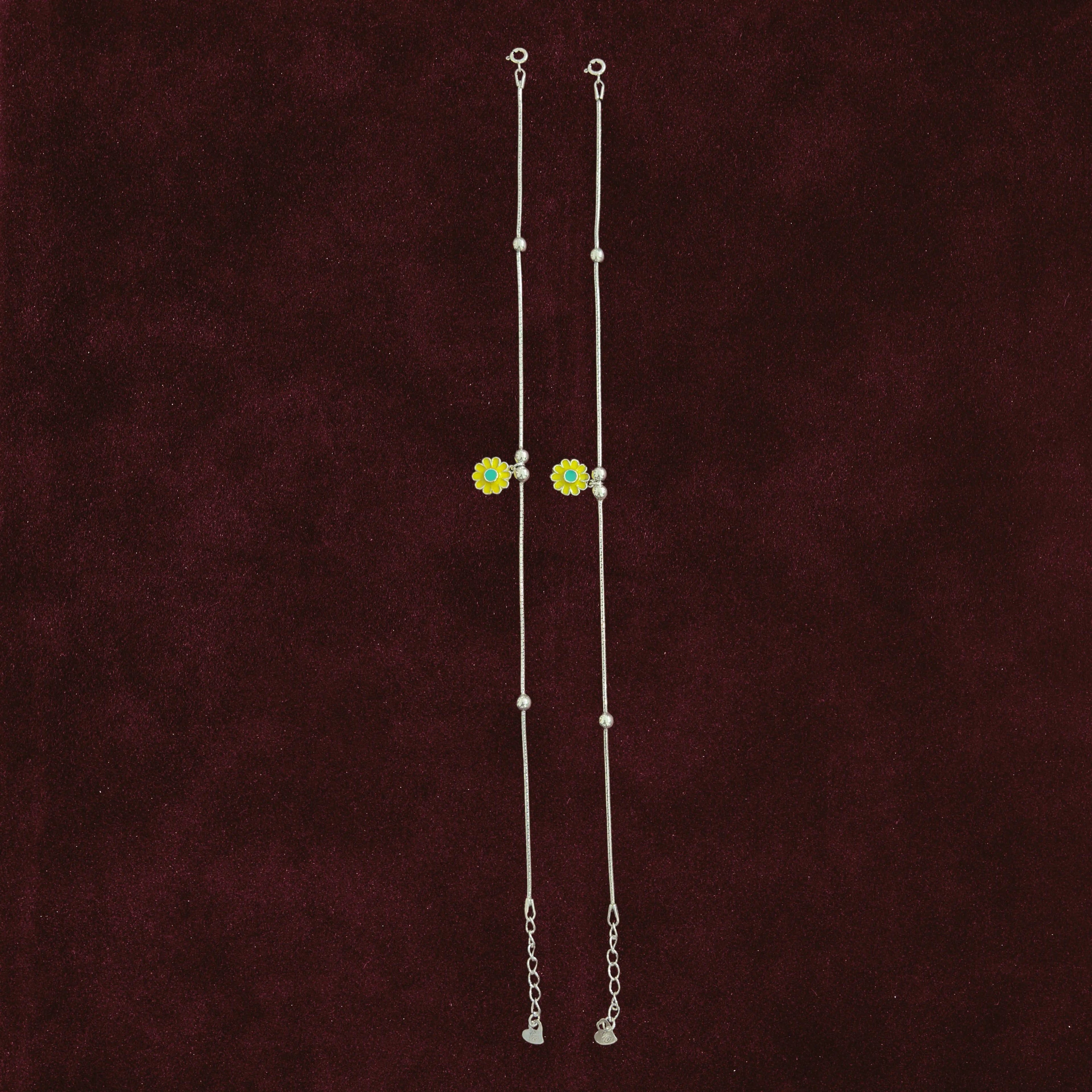 Sunflower Snake Chain Anklet Pair on maroon background