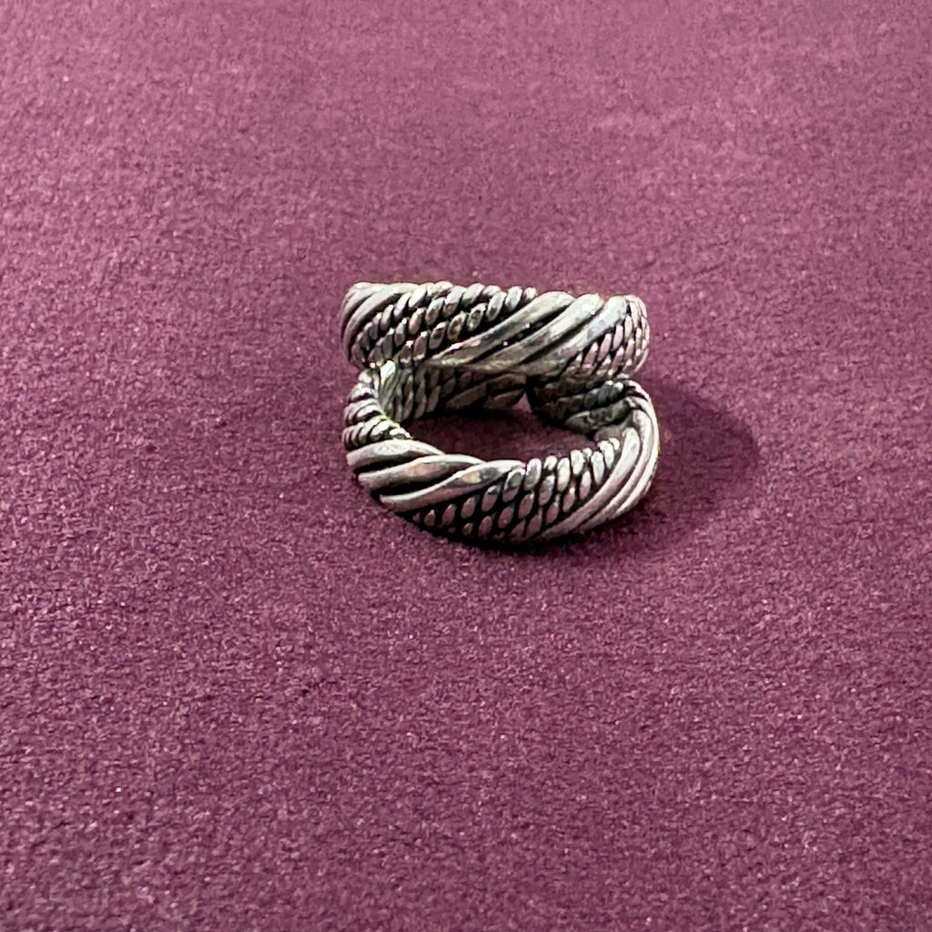 Multi-Textured Oxidized Twist Toe Rings on maroon background
