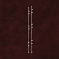 Classic Ghungroo Bar-Link Anklet Pair on maroon background