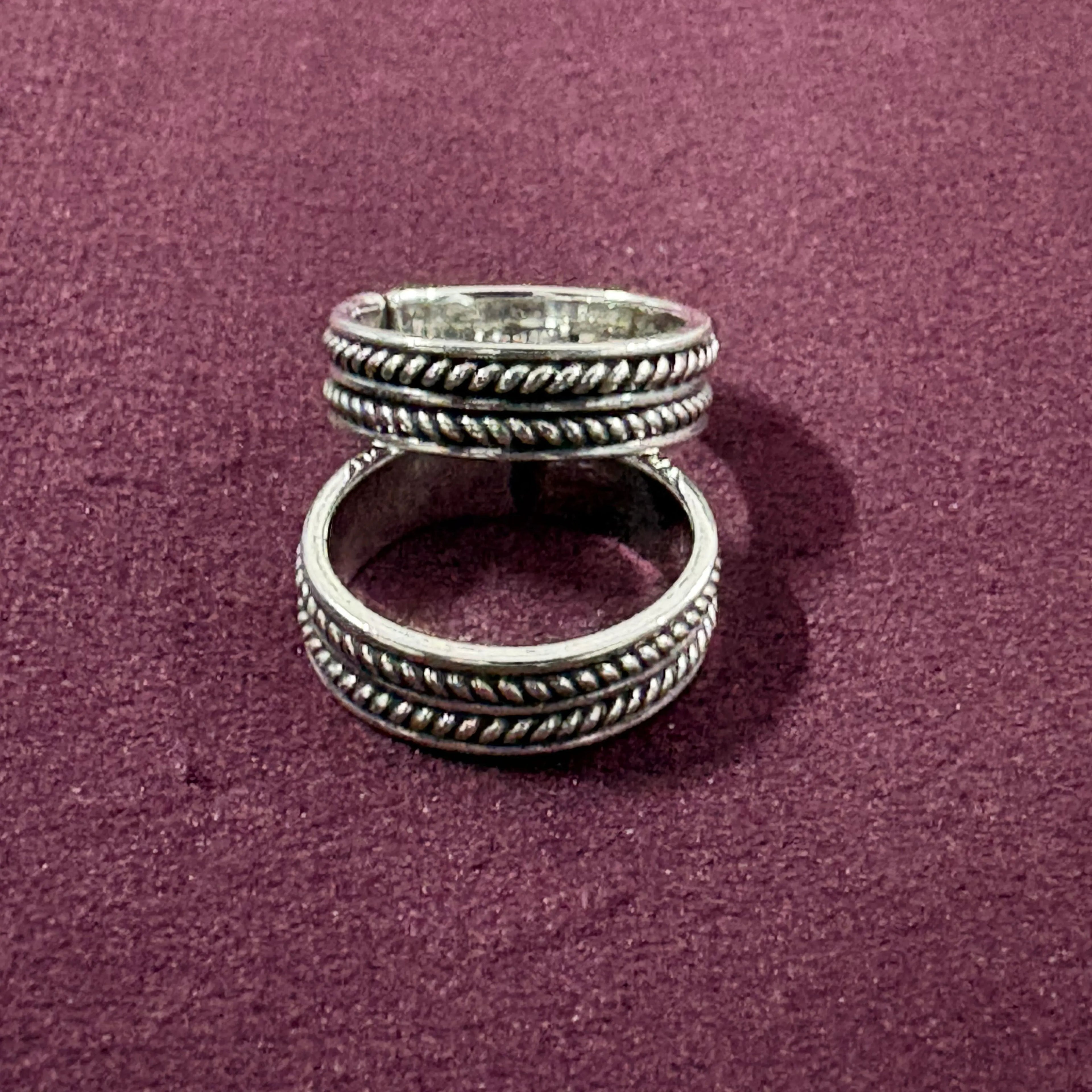 Classic Rope Band Toe Rings on maroon background