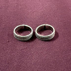 Classic Rope Band Toe Rings on maroon background
