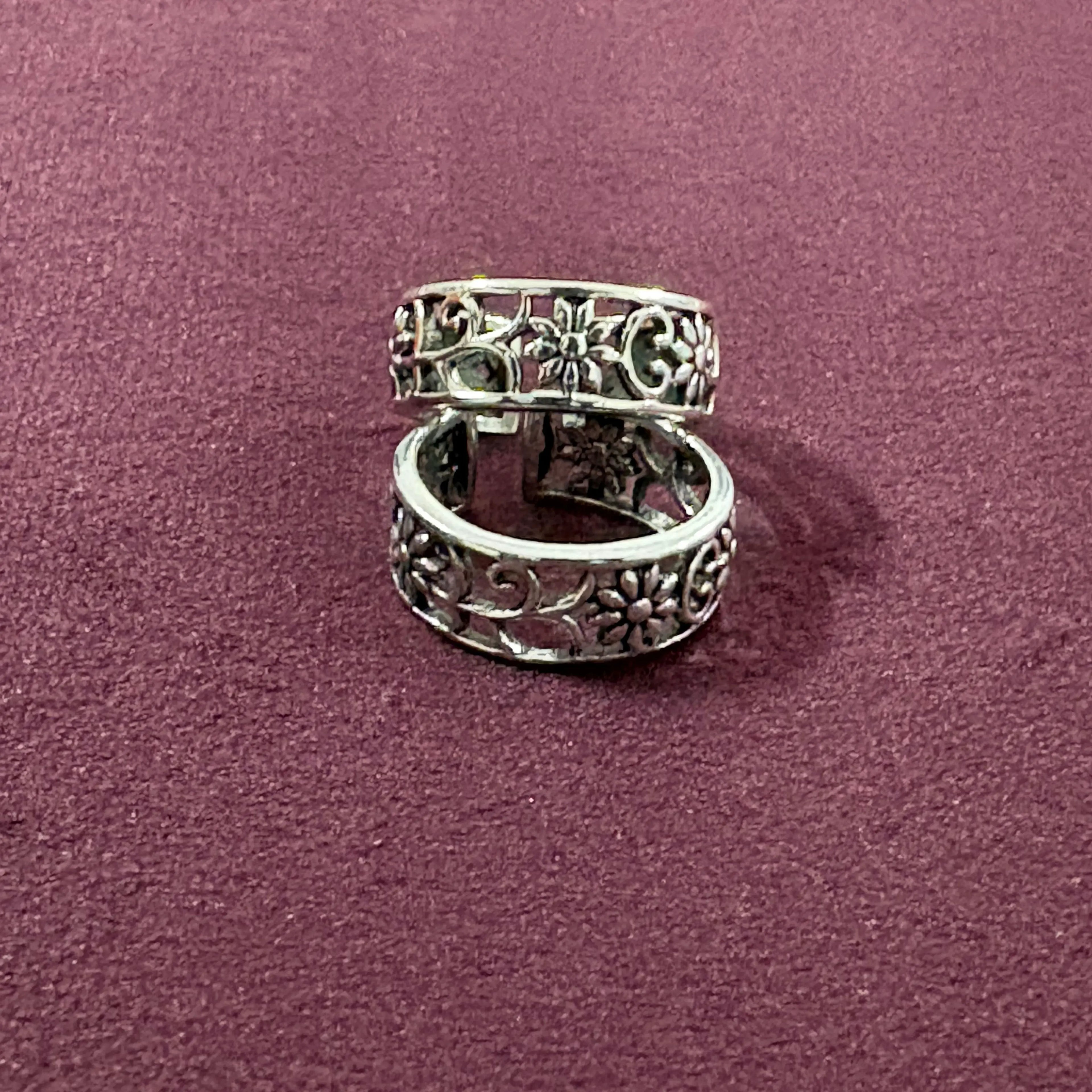 Garden Jaali Oxidized Toe Rings on maroon background