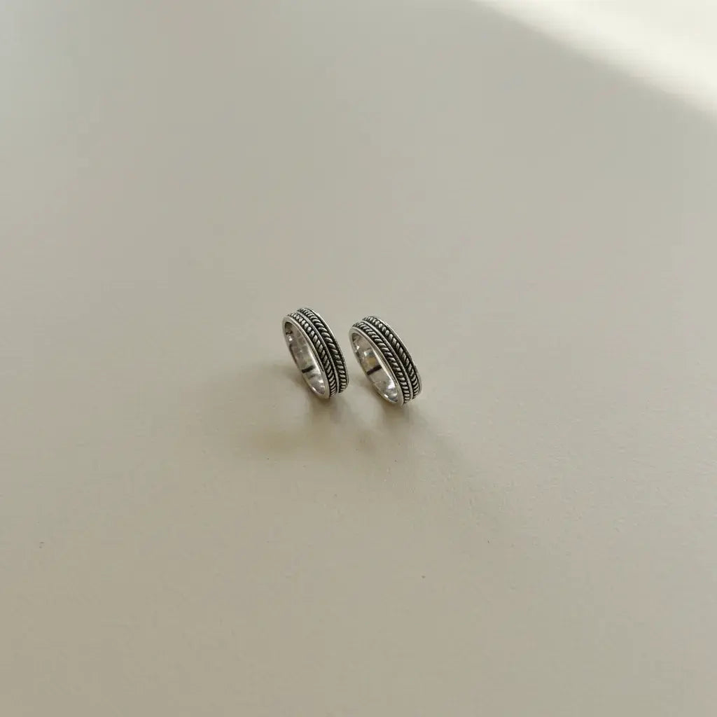 Flat lay image of Classic Rope Band Toe Rings 
