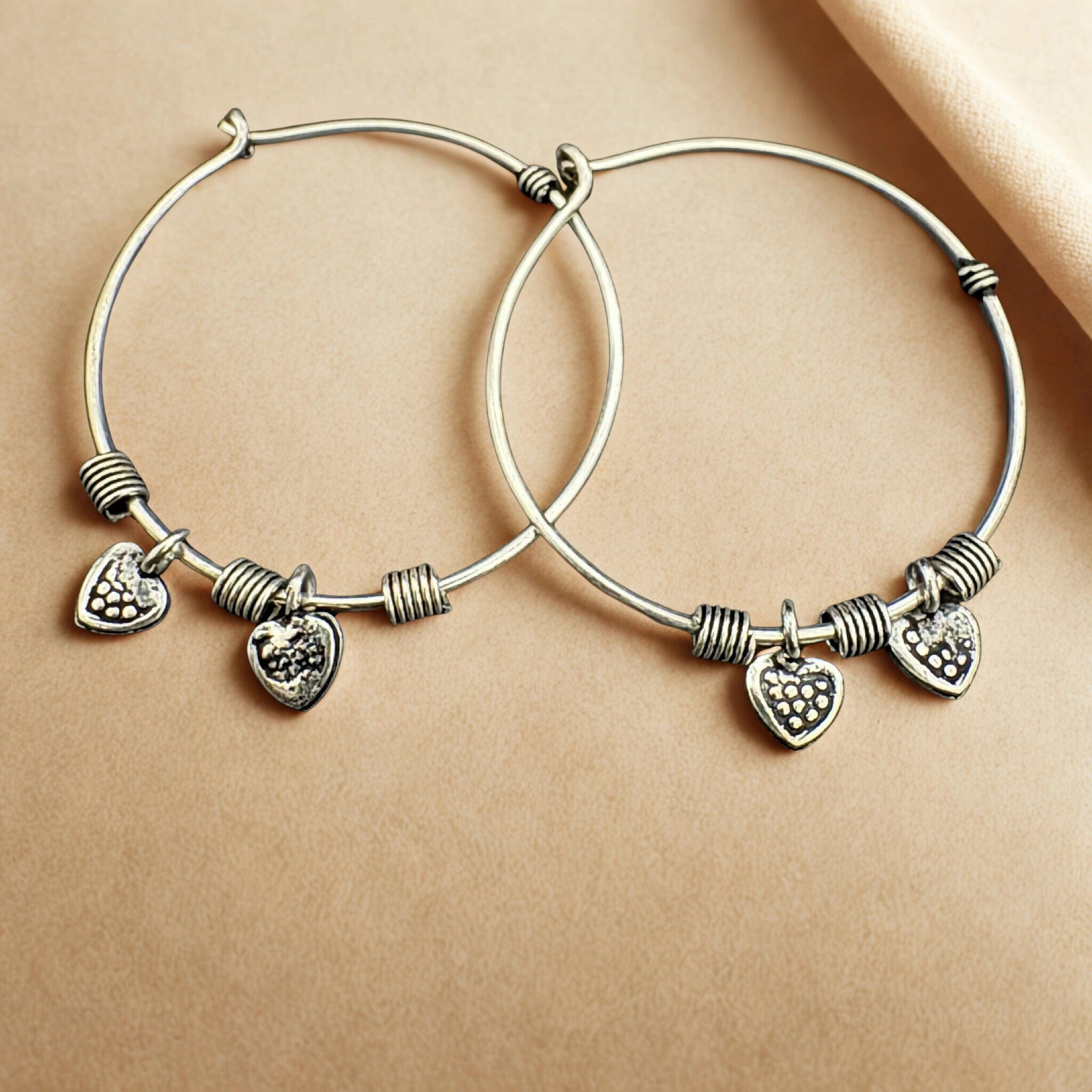 Sterling Silver Hoop Earrings with Heart Charms - Bhavya Silvers