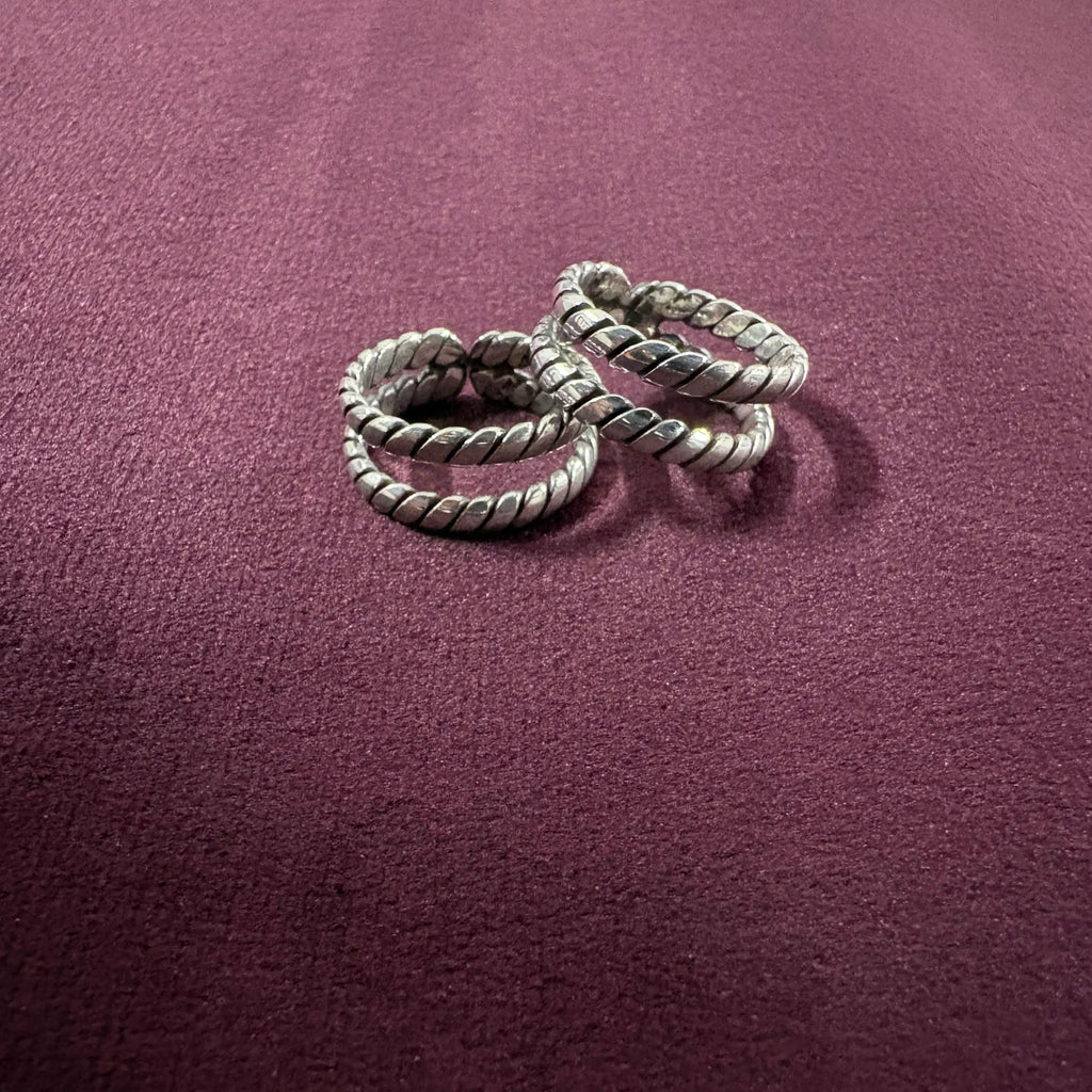 Flat lay image of Twisted Double-Rope Oxidized Toe Rings