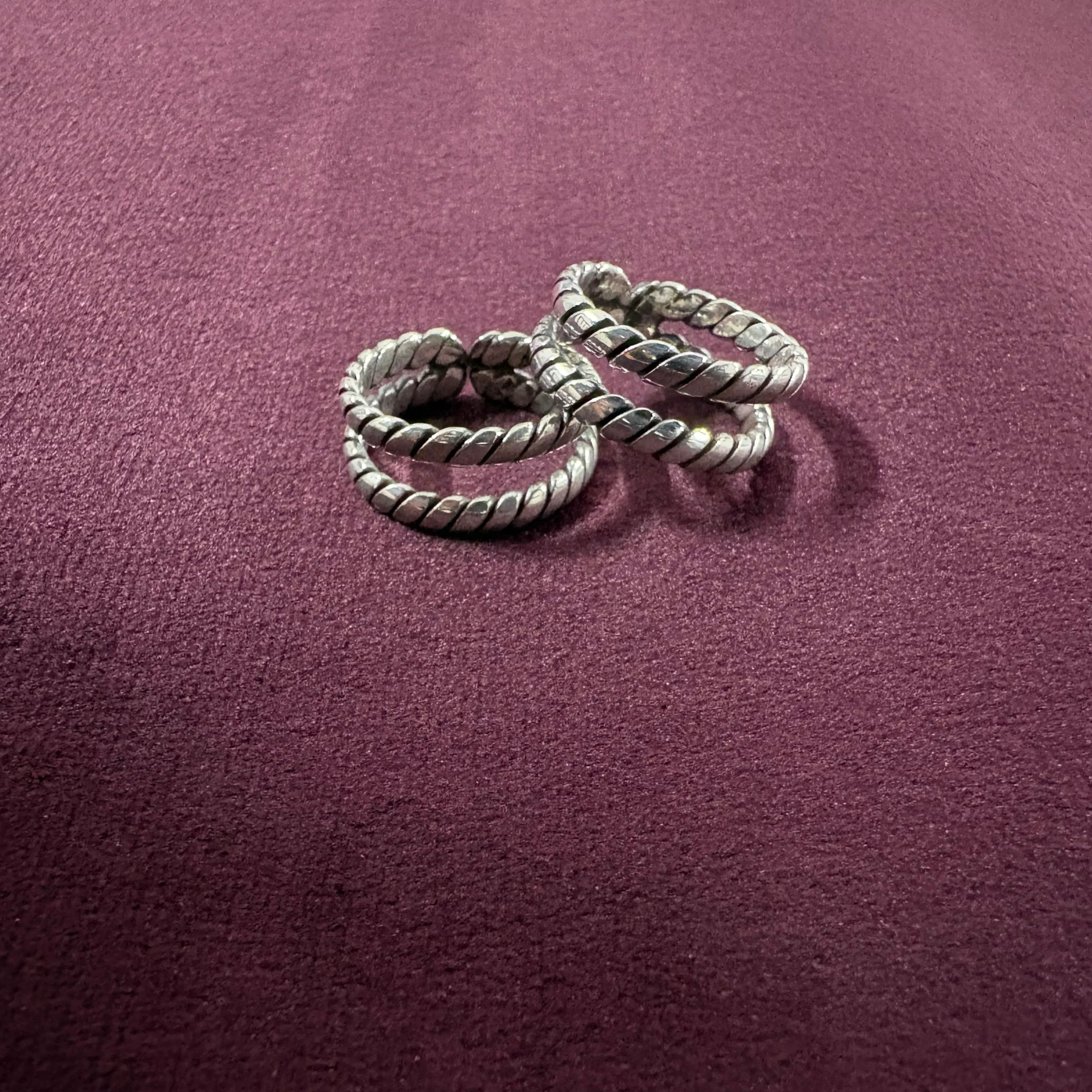 Flat lay image of Twisted Double-Rope Oxidized Toe Rings