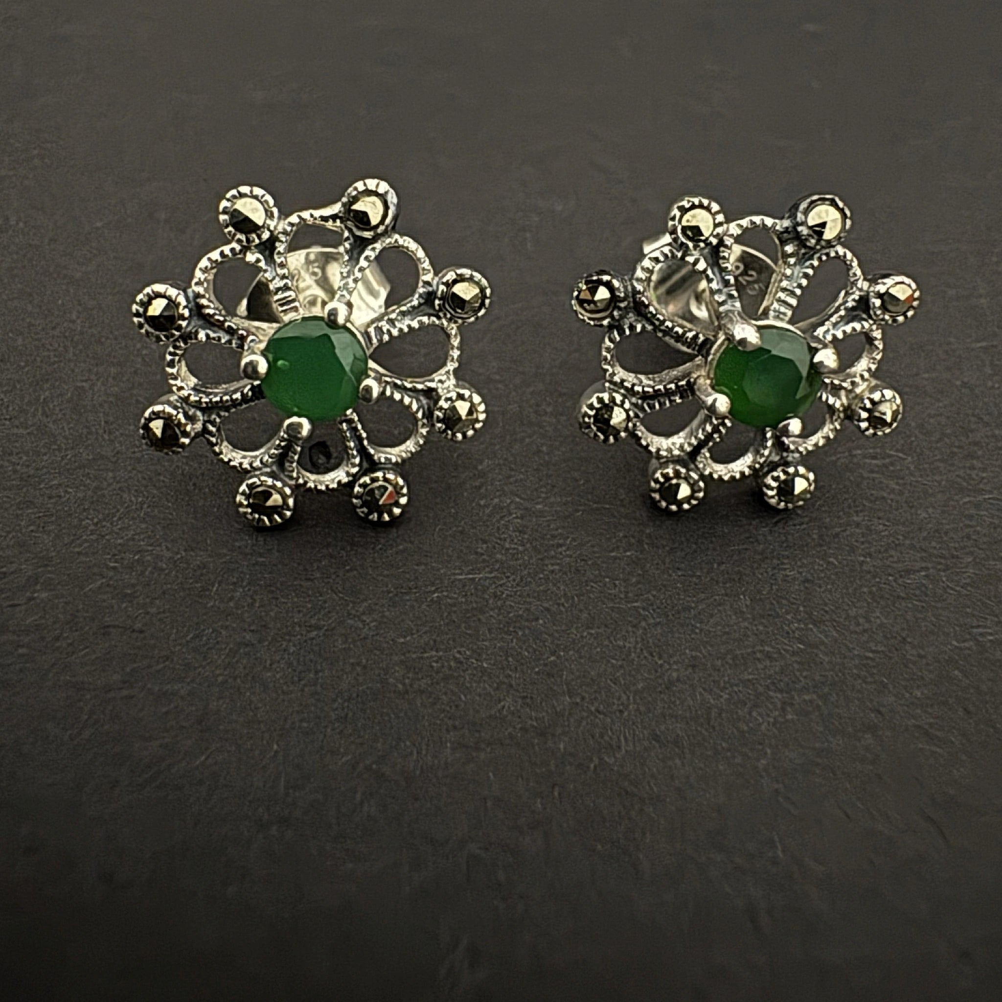 Sterling Silver Floral Stud Earrings with Green Gemstone