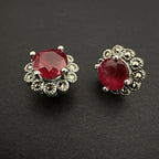 Sterling Silver Stud Earrings with Deep Red Faceted Stone